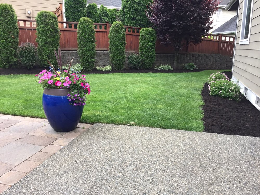 Finished landscape with bark delivered by Builders Sand and Gravel