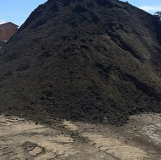 Black organic compost pile
